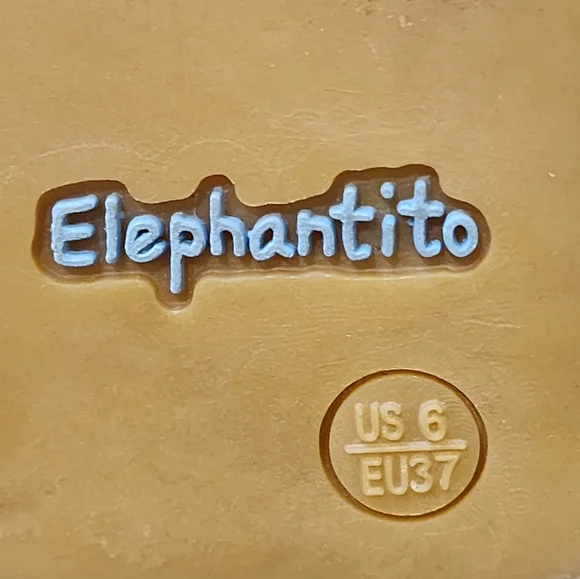 Elephantito patent leather ankle booties with brogue accent.Flat heel size 6 - Picture 6 of 7